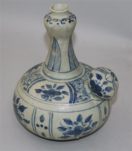 An Annamese blue and white porcelain kendi, 15th century, 23cm, sea-etched glaze